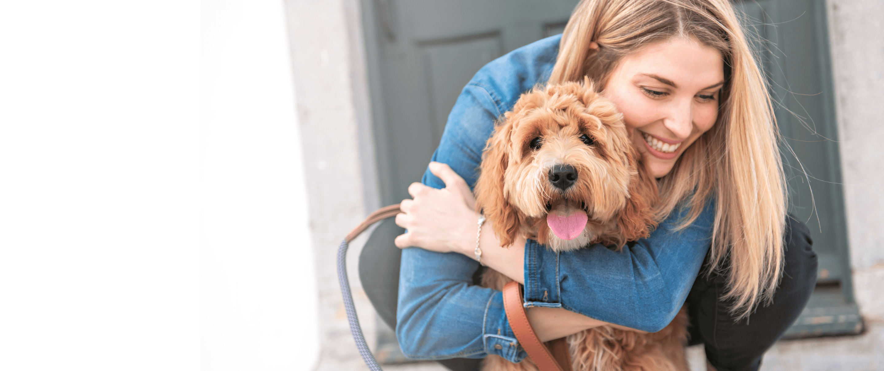 Woman with her dog after grooming at Good Clean Dog