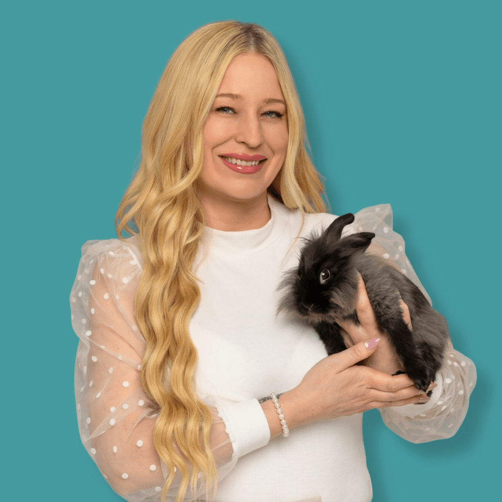Good Clean Dog Groomer Rebecca Holding Her Rabbit