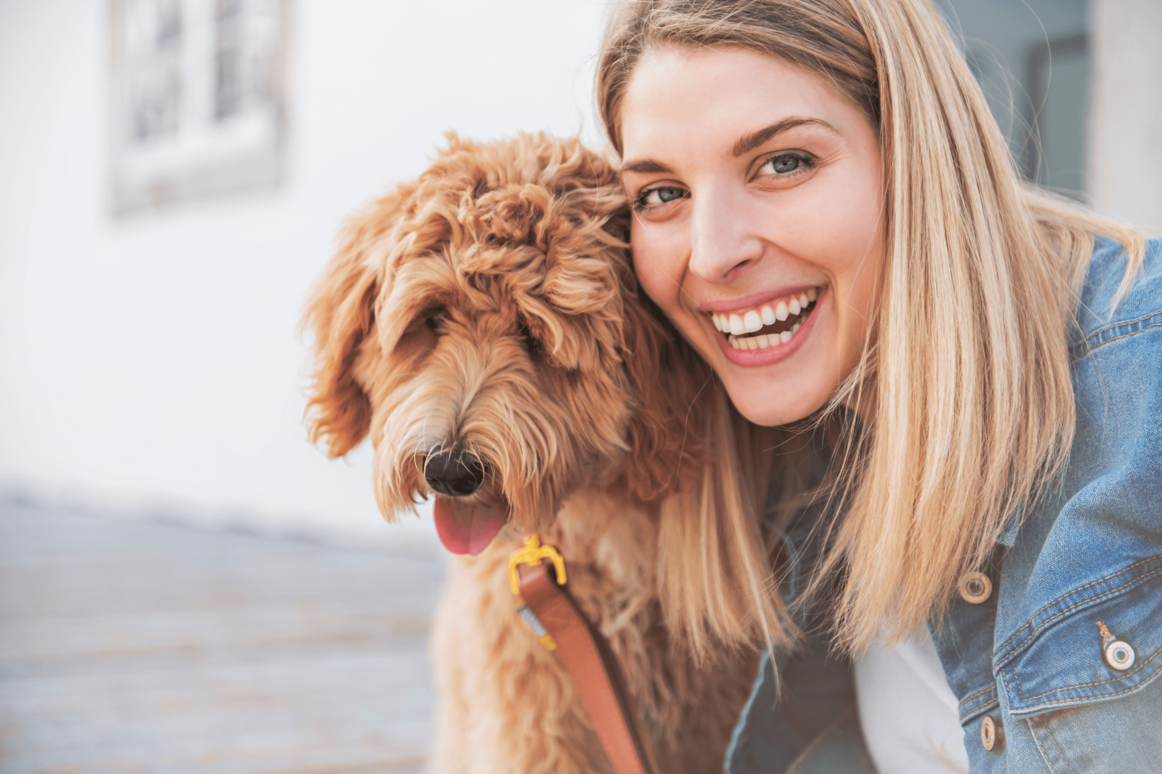 girl holding pet