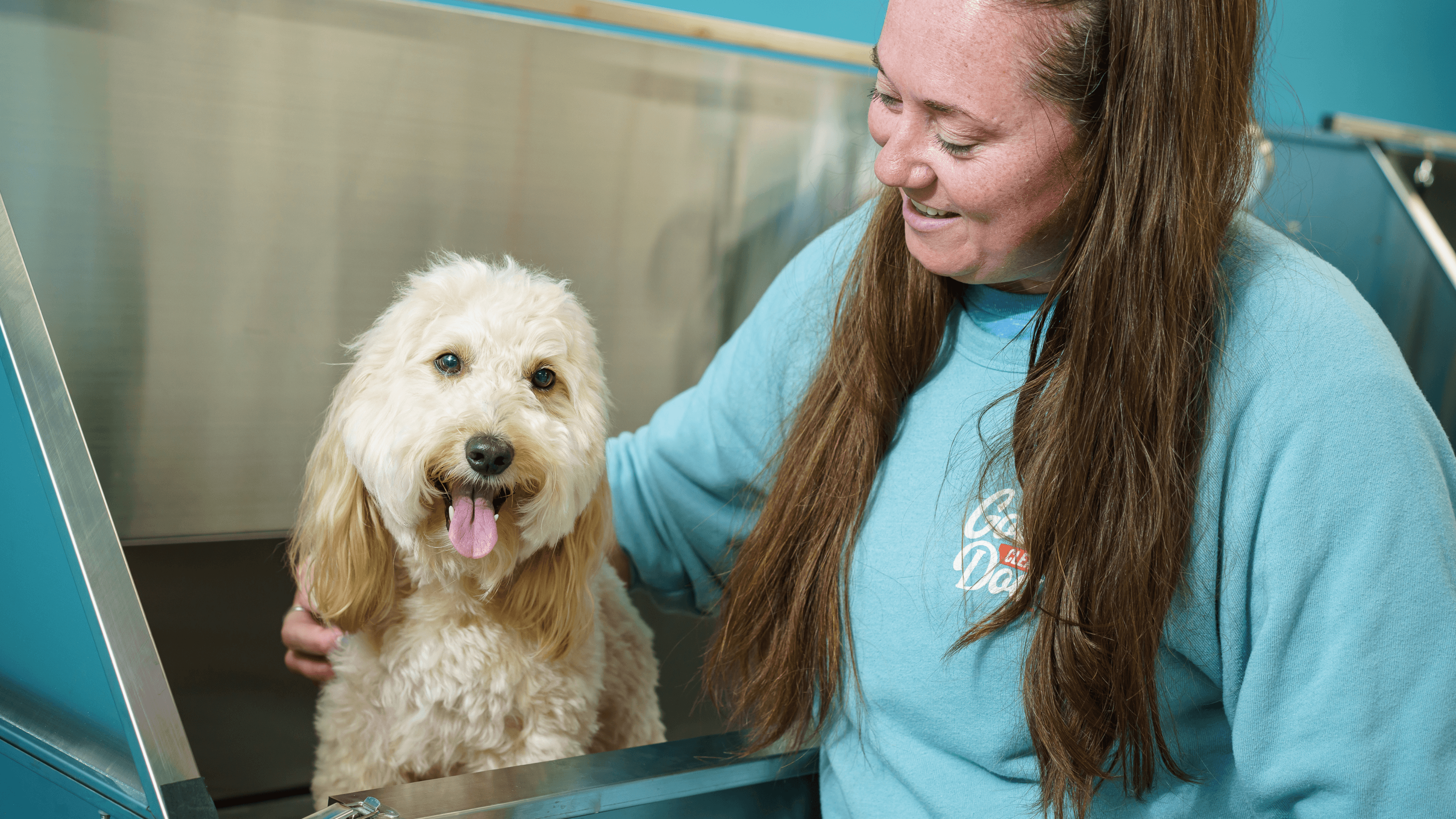 Good Clean Dog mascot Rosie and Director of Groomer Success Amanda